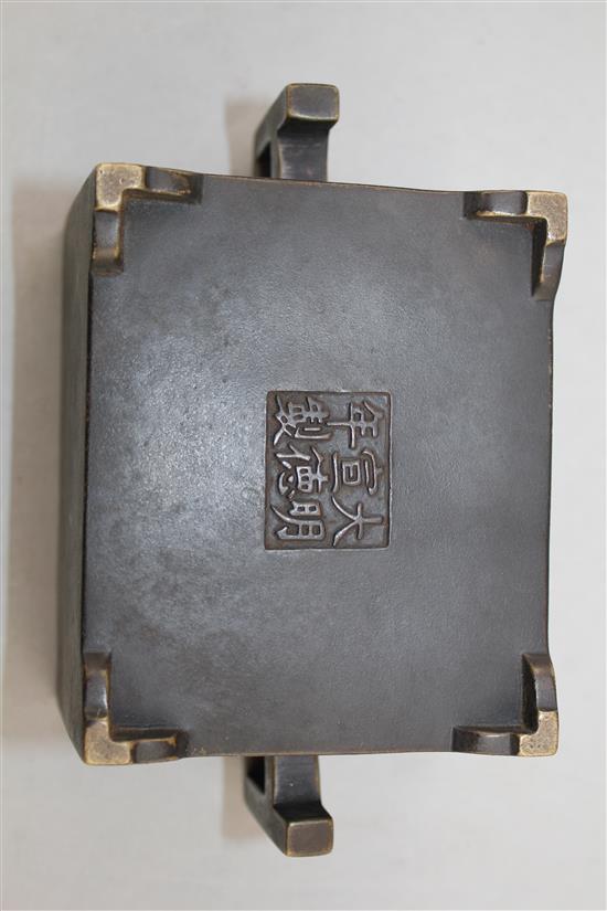 A Chinese bronze rectangular censer, Fang Ding, Xuande six character mark, 18cm across, 9cm
